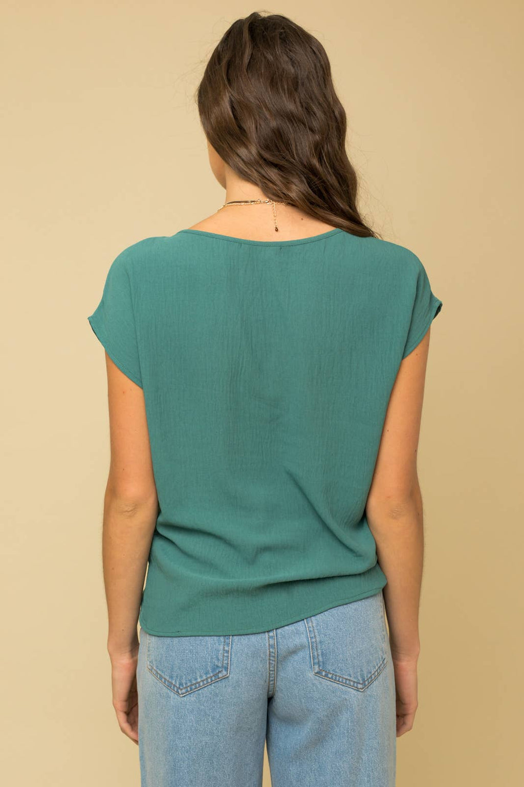 SOLID WOVEN TEE WITH FRONT KNOT DETAIL