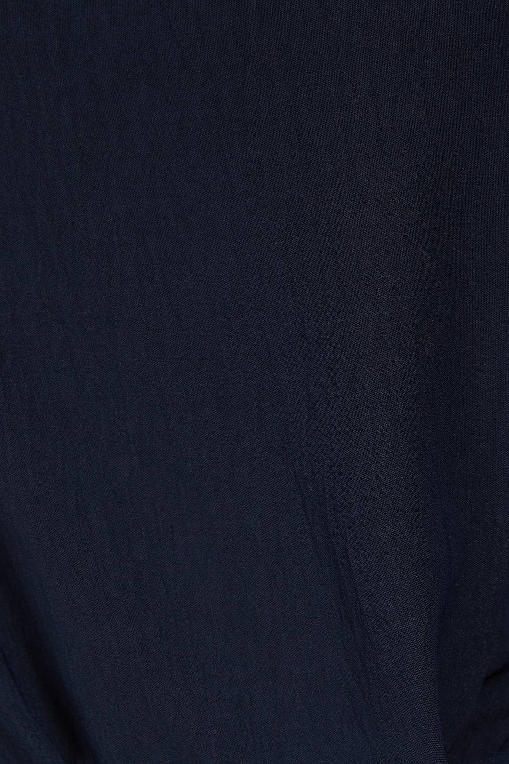 SOLID WOVEN TEE WITH FRONT KNOT DETAIL