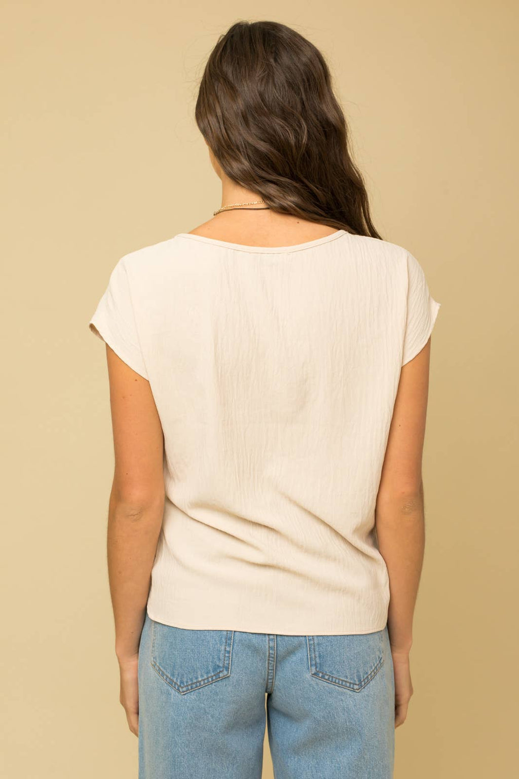 SOLID WOVEN TEE WITH FRONT KNOT DETAIL